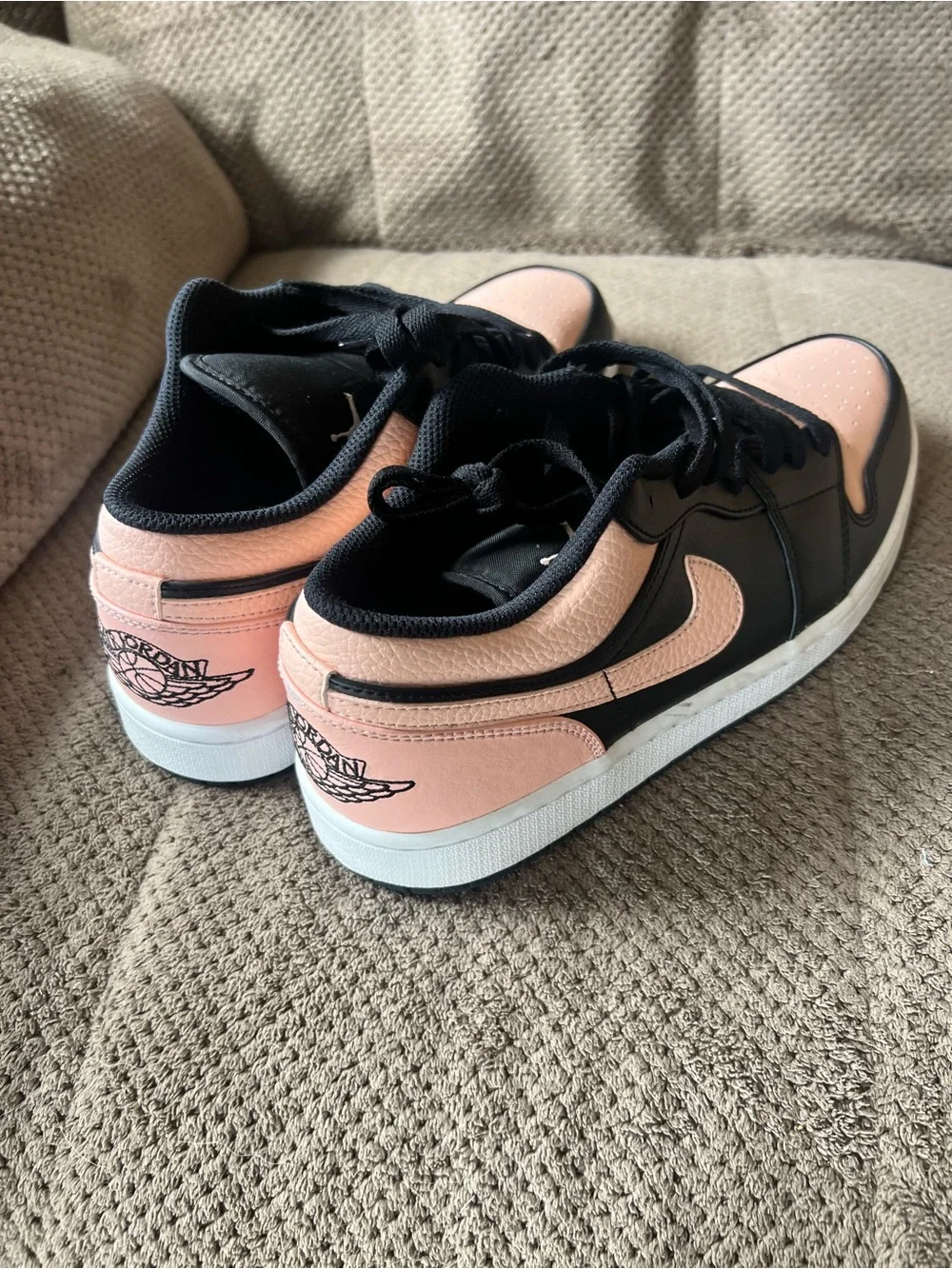 Air Jordan M10/W11.5 Low-Top Sneakers in Pink and Black